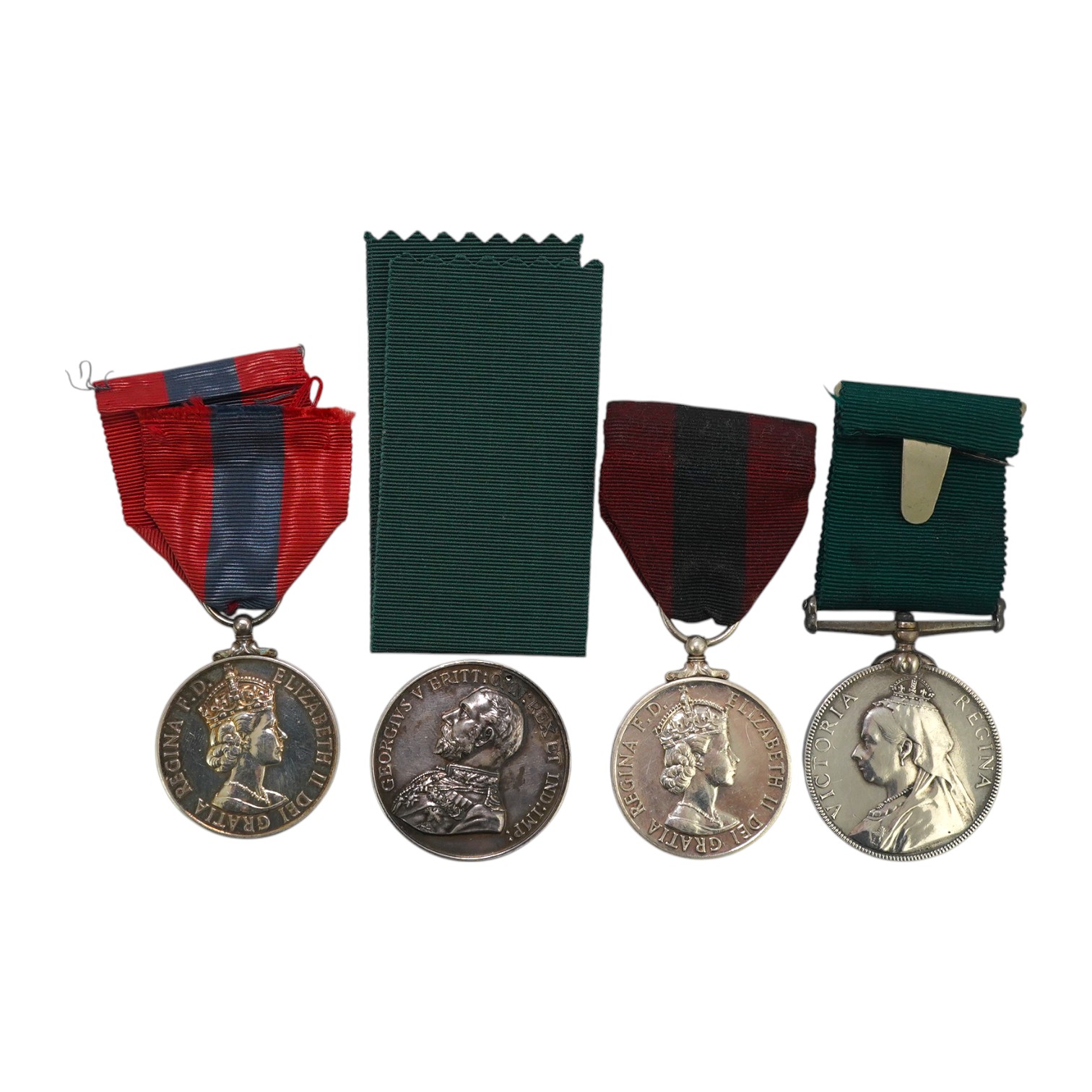 Four assorted Service medals; Vict unnamed Volunteer Long Service medal; GV Colonial Auxiliary Forces Long Service medal (disc only) to E.S.Ware; ERII ISM to Thomas Edward Downes; ERII ISM to William Henry Sharratt. Cond